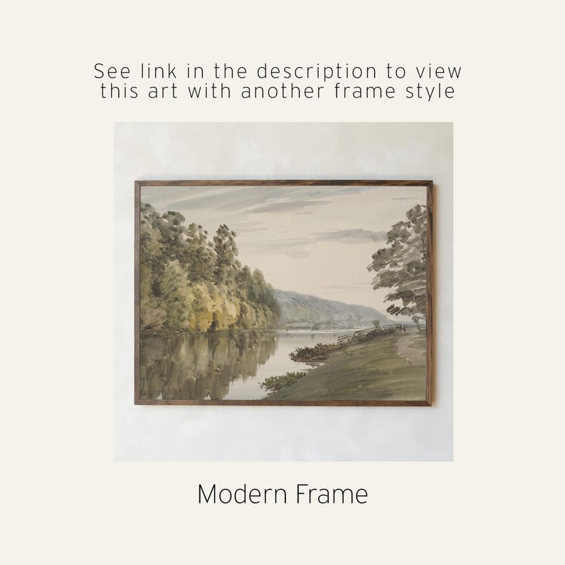 May include: A framed landscape art print featuring a river scene with trees and a distant hill. The artwork is in muted tones of green, brown, and gray. Text on the image reads, "See link in the description to view this art with another frame style" and "Modern Frame."