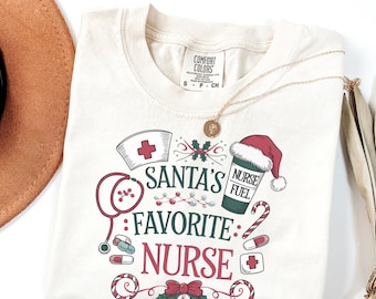Comfort Colors Santa’s Favorite Nurse Shirt, Christmas Nurse T-Shirt, Funny Holiday Nurse Gift, Medical Staff Xmas Tee, Retro Nurse Top