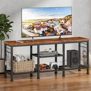 May include: A brown and black TV stand with a rustic wood top and black metal frame. The stand has multiple shelves for storage, including a woven basket, and a speaker. A large flat-screen TV is mounted on top.