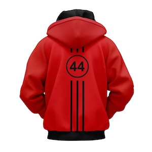 May include: A red hooded sweatshirt with a black hood and black accents. The back of the sweatshirt features a black circle with the number 44 inside, along with three vertical black stripes and three short lines above the circle.