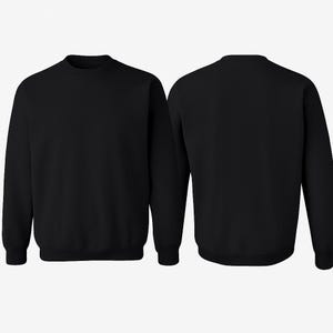May include: Two black crewneck sweatshirts are displayed. The front view shows the full sweatshirt, while the back view is also visible. The sweatshirts have long sleeves and a classic, simple design. The fabric appears to be a soft, comfortable material.