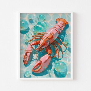 Op de afbeelding: Een ingelijste kunstdruk met een illustratie van een kreeft. De kreeft is afgebeeld in roze en oranje tinten, tegen een turquoise en blauwe achtergrond met bellen. Het kunstwerk is ingelijst in een witte lijst.