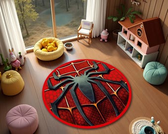 May include: A circular area rug featuring a prominent black spider emblem centered over a red and orange web-like pattern with a textured honeycomb design. The rug has a solid red border and is positioned on a wooden floor in a room.