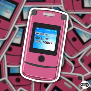 May include: A pink flip phone sticker with a white border. The phone's screen displays a text message that reads "CALL UR SENATORS" with a heart symbol. The sticker has a glossy finish and is set against a background of similar stickers.