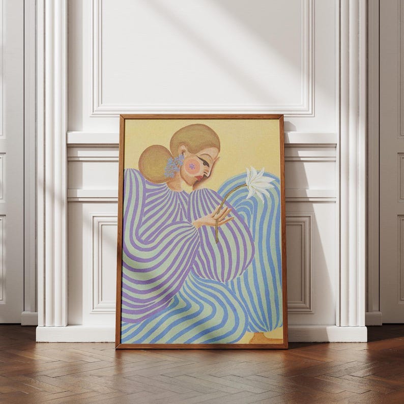 Modern abstract portrait of a woman in a flowing lavender and mint striped dress, holding a white flower. Set against a pastel yellow and blue background, this digital art print features fashion-inspired, feminine energy with bold lines and soft colors. Horizontal layout, perfect for contemporary, editorial-style, and artistic interior decor