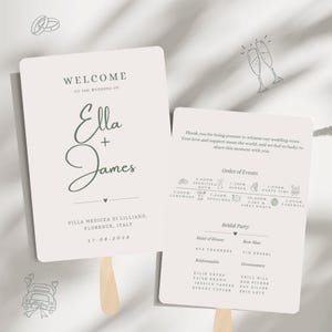 May include: Two off-white wedding program fans with rounded corners and wooden handles. The front displays "Welcome to the wedding of Ella + James" with location and date. The back lists the order of events, bridal party, and a thank you message.