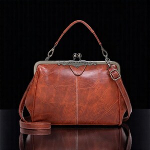 Bolsa de ombro retrô em couro sintético com acabamento em óleo para mulheres, bolsa transversal pequena com clipe, bolsa carteiro fofa, presente para meninas ou para festas