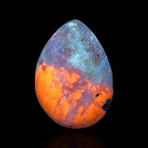 99.045 Carat Fluorescent Green Sodalite Cabochon with Hackmanite Mica Pyrite Collector Gemstone from Afghanistan