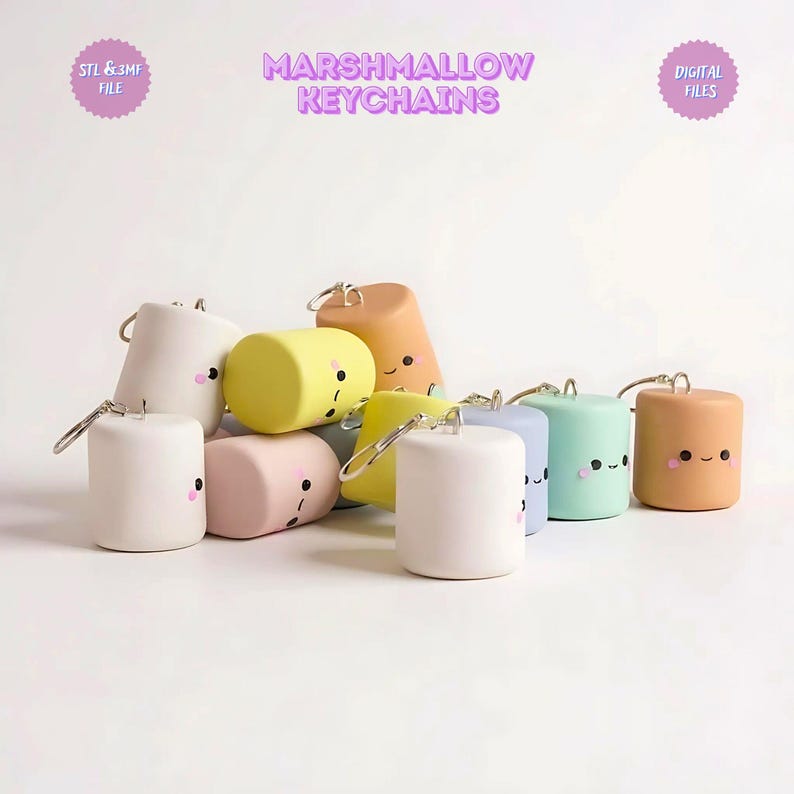 May include: A collection of colorful marshmallow-shaped keychains with smiling faces. The keychains are in various pastel colors, including pink, yellow, blue, and peach. The text "MARSHMALLOW KEYCHAINS" is displayed above the keychains.