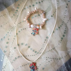 Disney Handmade Stitch Anhänger Halskette und Muschel Armband im Set