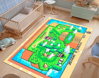 Puede incluir: Una alfombra rectangular con un diseño colorido y pixelado de un nivel de videojuego. La alfombra tiene un borde amarillo y un paisaje azul y verde con el texto "Yoshi's House". La alfombra está colocada sobre un suelo de madera.