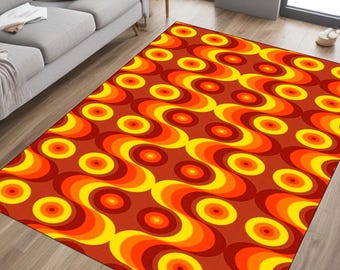 May include: A retro-style area rug with a repeating pattern of orange, yellow, and red circles and waves on a brown background.
