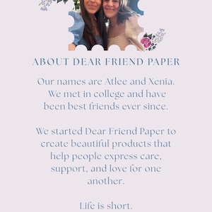 May include: A light purple informational card featuring a postage stamp-shaped photo of two individuals, Atlee and Xenia, framed by floral illustrations. The text reads: ABOUT DEAR FRIEND PAPER, Our names are Atlee and Xenia. We met in college and have been best friends ever since. We started Dear Friend Paper to create beautiful products that help people express care, support, and love for one another. Life is short. So go ahead&mdash;share your love.