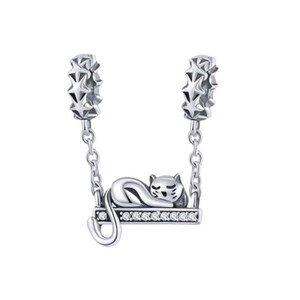 May include: A silver-colored charm featuring a sleeping cat on a swing. The swing is adorned with small, clear stones and hangs from two star-shaped connectors. The cat is curled up, with its tail gently curved.