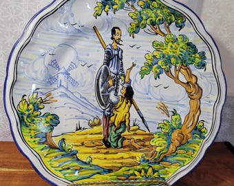 Antique hand-painted Spanish Talavera pottery plate depicting Don Quixote and Sancho Panza