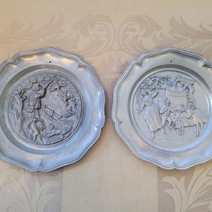 Vintage German Pewter Embossed Angel Maker&#39;s Mark Wall Décor Plates 9&quot; 2 Set