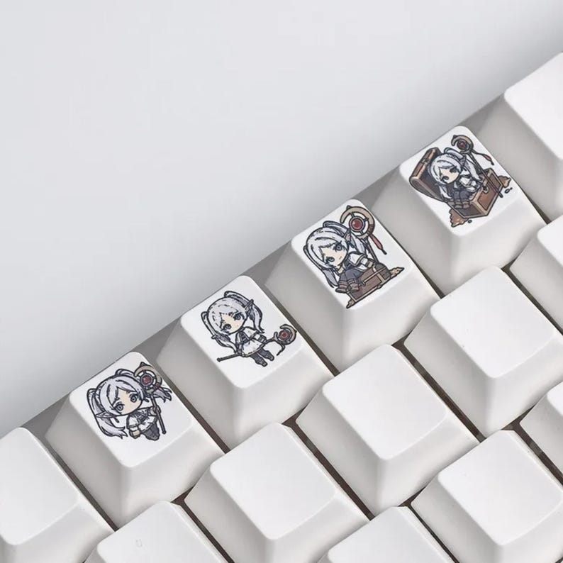 May include: White keyboard keys with anime-style character designs. The keycaps feature illustrations of a female character with white hair and various poses, including holding a staff and sitting on a chest.