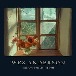 May include: A vintage window with a view of green trees and a cloudy sky. A bouquet of orange and red flowers in a clear glass vase sits on the windowsill. The text "WES ANDERSON PRESETS FOR LIGHTROOM" is displayed below the image.