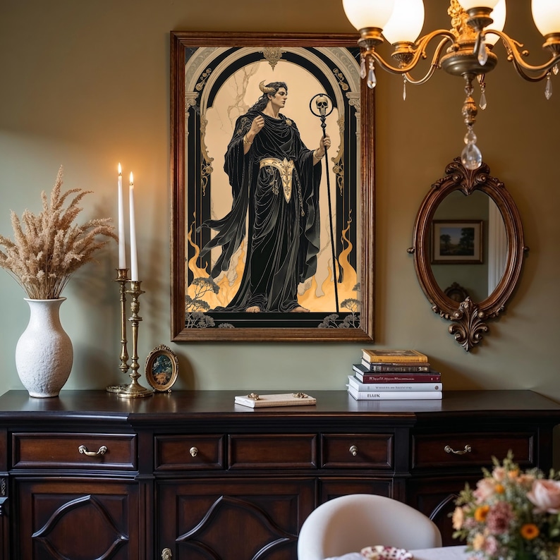 May include: A framed artwork depicts a figure in black robes holding a staff with a skull. The artwork has a gold and black color scheme, with a dark wooden frame. The image is displayed above a dark wooden cabinet.