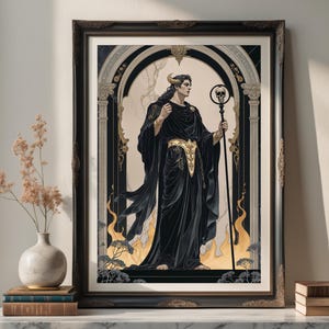 May include: Framed art print featuring a figure in black robes with gold accents, holding a staff topped with a skull. The artwork has a gothic theme, set against a backdrop of an archway and flames. The print is displayed on a white surface.