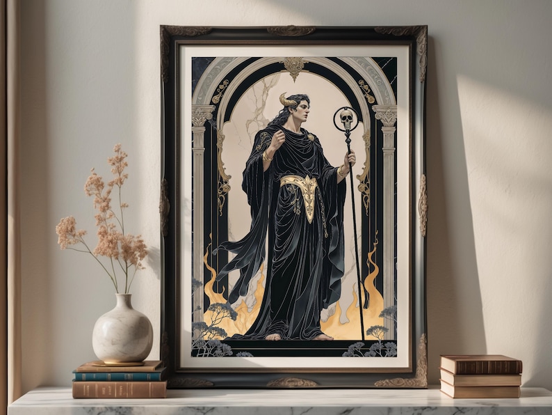 May include: Framed art print featuring a figure in black robes with gold accents, holding a staff topped with a skull. The artwork has a gothic theme, set against a backdrop of an archway and flames. The print is displayed on a white surface.