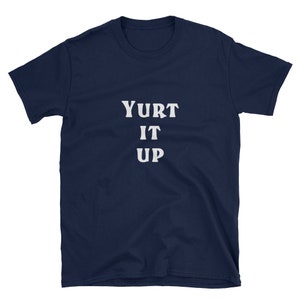 May include: A navy blue t-shirt with the text "Yurt It Up" printed in white.