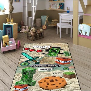 May include: A rectangular Minecraft-themed rug featuring pixelated graphics of a sword, TNT blocks, a Creeper, and a cookie. The rug has a map-like background with the word "Minecraft" prominently displayed.