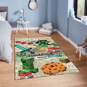 May include: A rectangular Minecraft-themed rug featuring pixelated graphics of a Creeper, TNT blocks, a sword, and a cookie. The rug has a map design with the word "Minecraft" and "Creeper" visible.