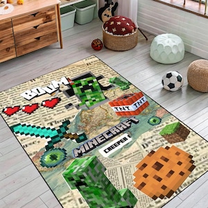 May include: A rectangular Minecraft-themed rug featuring pixelated graphics of a Creeper, TNT blocks, a sword, and a cookie. The rug has a map design in the background with the word "Minecraft" in a blue and white font.