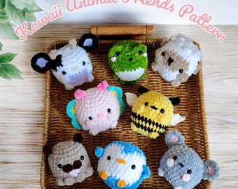 May include: A collection of eight crocheted animal plushies in a wicker basket. The plushies include a cow, frog, sheep, butterfly, bee, pug, penguin, and a mouse. The plushies are all different colours and have cute faces.