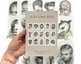 May include: A rectangular paper portfolio titled Just One Bite featuring a grid of fifteen small character illustrations. The cover includes the text Mini Portfolio and Mabgraves.com, with several larger individual character art prints displayed behind it.