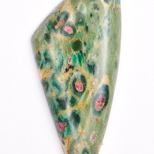 May include: A green and pink cabochon gemstone with a unique pattern. The stone is cut in a teardrop shape and has a smooth, polished surface.