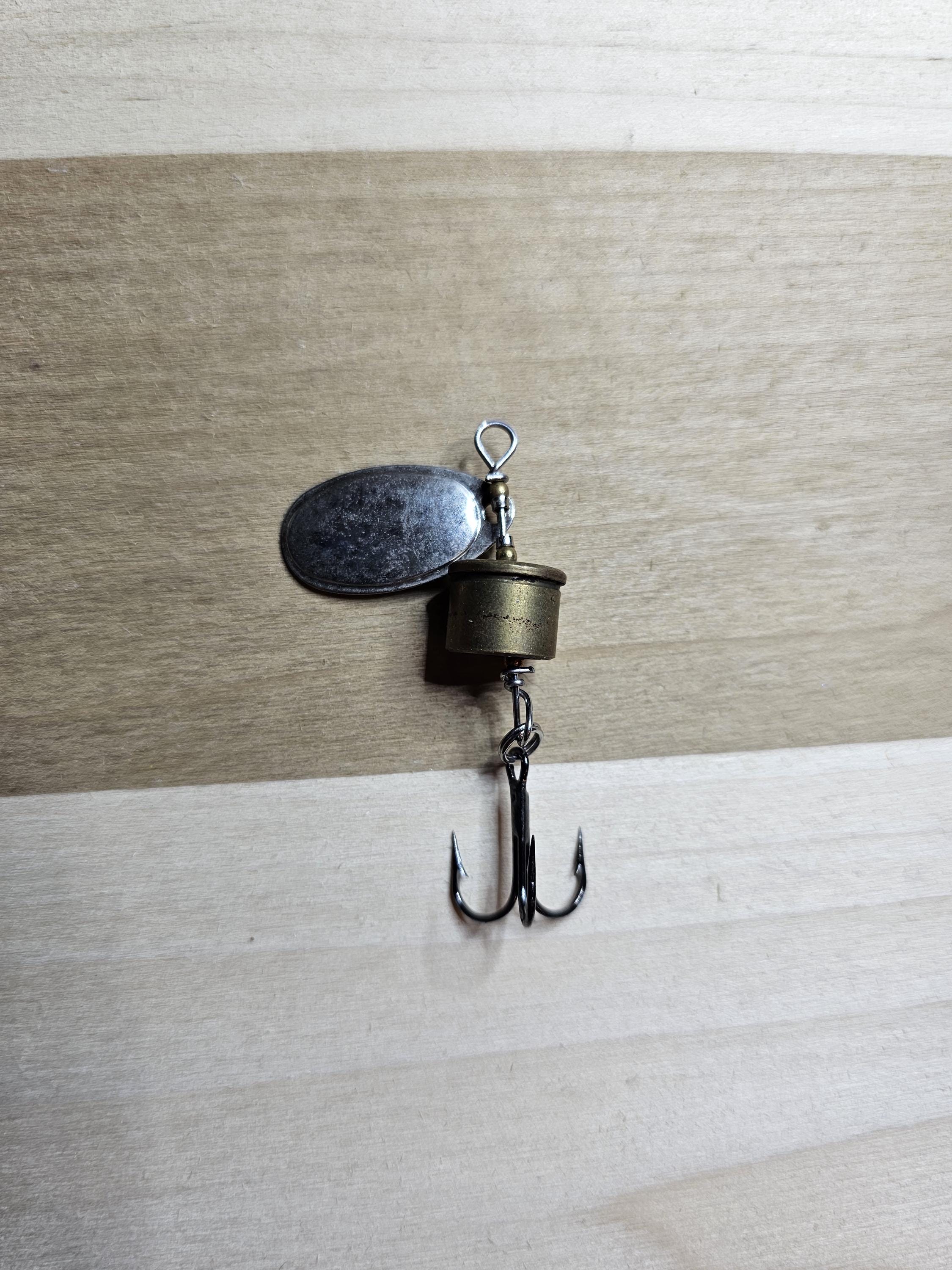 bullet casing fishing lure Spinner The Bullet Lure boasts a sleek and aerodynamic design that cuts through the air with unparalleled finesse The Fishing Armory 12 Gauge