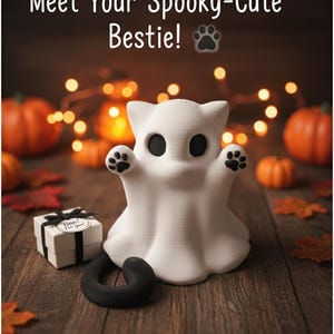 May include: A white ghost-shaped figurine with black eyes and paw prints on its hands. The text "Meet Your Spooky-Cute Bestie!" is at the top. A small gift box and a black curved object are in front of the figurine. Pumpkins and fall leaves are in the background.