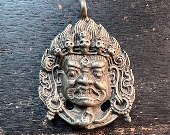 Old Tibetan Brass Mahakala Pendant | Wrathful Deity Buddha Head Amulet | Vintage Buddhist Talisman from Nepal Tibet