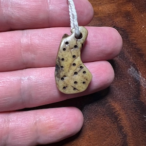 Hand-Carved Yak Bone Charm – Tantric Shaman Necklace for Inner Strength