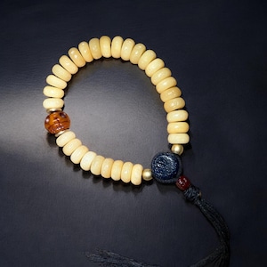 Tibetan Yak Bone Wrist Mala - Om Mani Padme Hum Mantra Beads with Agate & Citipati Skull