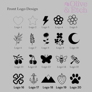 May include: A sheet of paper with 20 different logo designs. The logos are black and white and include a heart, star, lightning bolt, flower, moon, olive branch, butterfly, bee, dragonfly, crossbones, anchor, mountains, strawberry, and paw print.