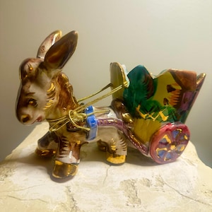 Vibrant vintage Italian donkey cart planter.