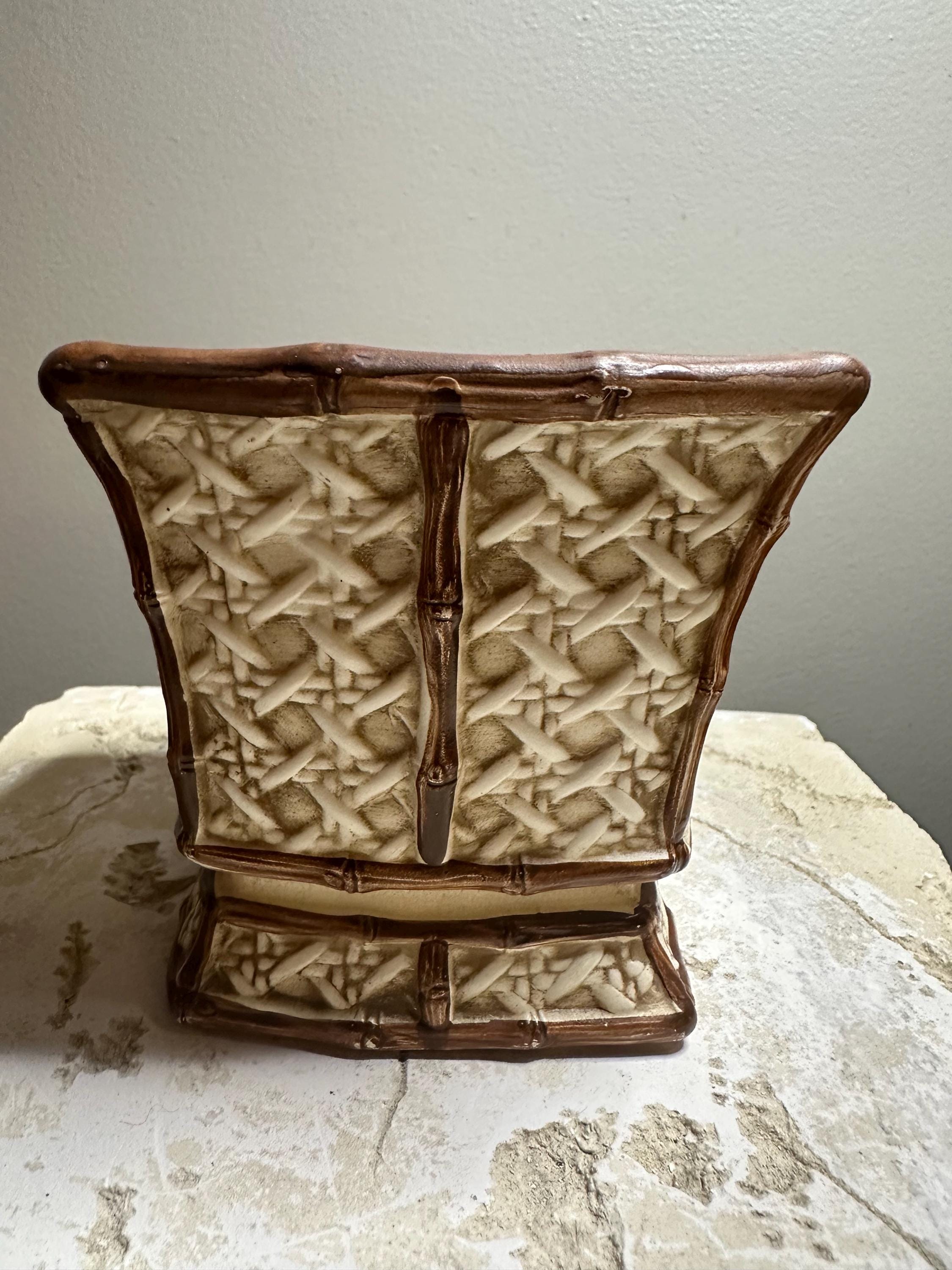 This is a Vintage Inarco Ceramic Planter With a Faux Bamboo and
