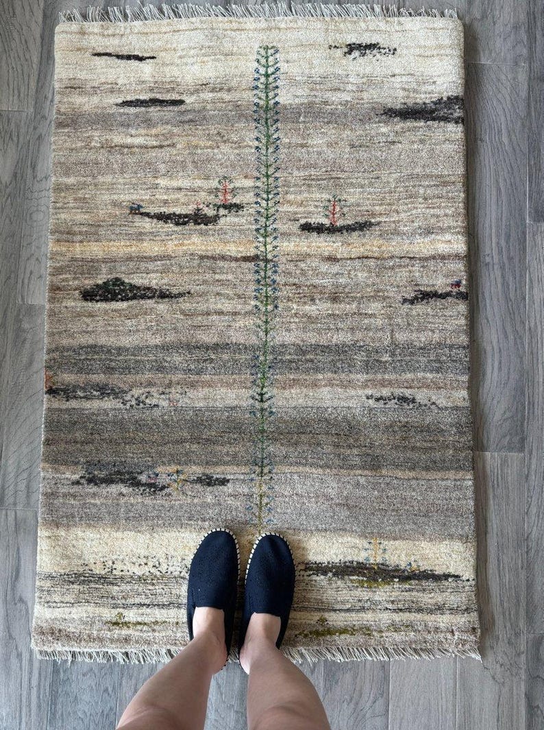 Cream and Gray Plush Wool Accent Rug.