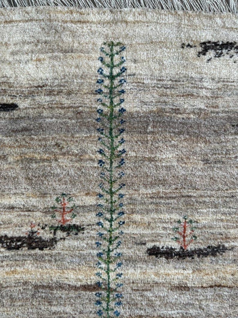Cream and Gray Plush Wool Accent Rug.