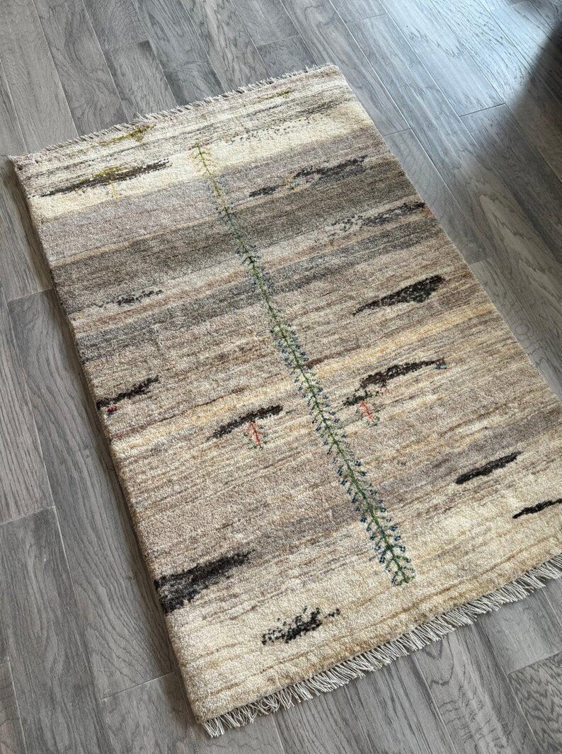 Cream and Gray Plush Wool Accent Rug.