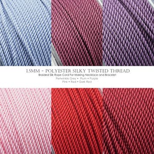 May include: A trio of cream-glazed ceramic mugs, each adorned with a hand-painted floral pattern in blue, green, and yellow hues. The mugs have a rounded form and a handle, ideal for enjoying a warm beverage.