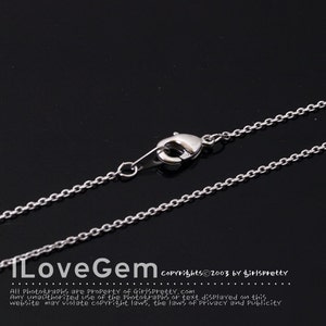 May include: A silver-colored necklace chain with a lobster clasp. The chain is made of small, interconnected links. The image includes the text "ILoveGem" and copyright information.