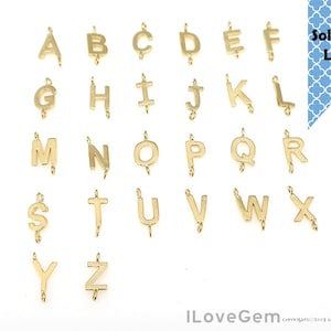 May include: Gold-toned alphabet letter charms with soldered loops. The letters are A through Z.