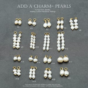 May include: A collection of white pearl charms with gold-toned metal loops, labelled with numbers 2 through 21. The text reads ADD A CHARM- PEARLS, To Your Own Jewelry, Making Custom Necklace, Earrings, and Each piece of pearls has variations.