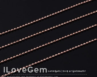 May include: Close-up of four strands of delicate, rose-gold ball chain. The chains are evenly spaced against a dark background. The image includes the text "ILoveGem" and copyright information.