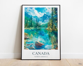May include: A watercolor painting of a lake surrounded by trees and mountains. The painting is framed in a black frame and has the text "CANADA NORTH AMERICA" at the bottom.