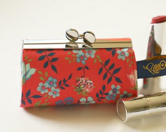 Lipstick Case/ Lipbalm case/ silver metal frame/ Liberty cotton/delicate flowers on a red background